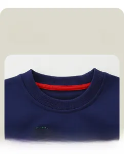 Detail of ribbed crew neck and red reinforced inner collar tape on navy blue sweatshirt