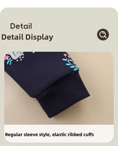 Detailed macro view of elastic ribbed cuffs on a navy blue cotton knit toddler jacket