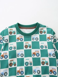 Kids long sleeve sweatshirt featuring green checkerboard pattern and tractor prints
