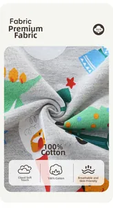 Gros plan d'un tissu 100% coton avec des motifs de sapins de Noël et d'étoiles