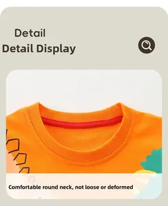 Detail view of the orange cotton T-shirt showing a durable crew neck with red piping