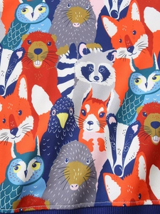 Kids autumn sweatshirt featuring colorful forest animal prints and navy ribbed cuffs