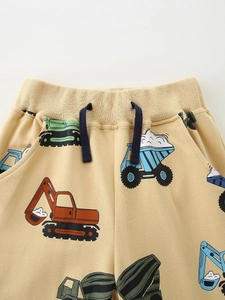 Kids cotton joggers with elastic waist and colorful construction vehicle patterns