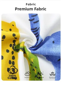 Close-up of 100% cotton fabric with yellow leopard print and blue animal patterns