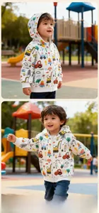 Detail of boys hoodie with construction vehicle print and full zipper closure