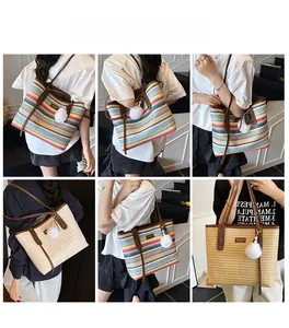 Detail of straw woven tote bag featuring colorful stripes and leather shoulder straps