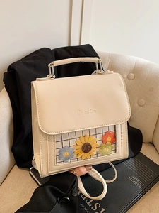 Chic beige crossbody bag with sunflower embroidery and a trendy checkered pattern