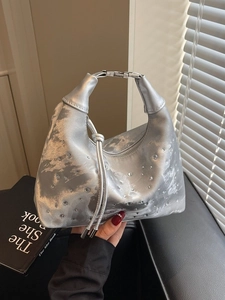 Silver metallic pleated dumpling bag with sparkling rhinestones and metal buckle