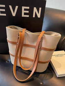 Retro cream canvas tote bag with brown leather straps and silver rivet details