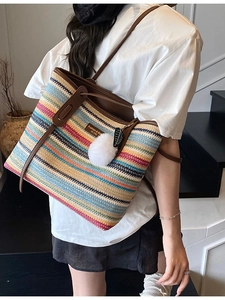 Bohemian large straw tote bag with colorful stripes and tassel for beach vacations
