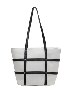 Large capacity tote bag with white canvas, black leather trim and metal rivets