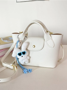Mini white lychee grain tote bag with crossbody strap and cute plush rabbit charm
