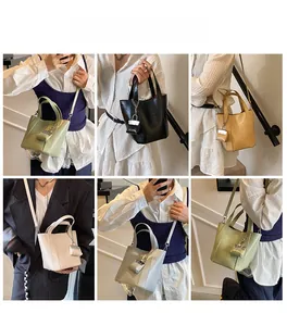 Multiple carry styles of pebbled leather bucket bag in five trendy seasonal colors