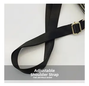 Close-up of black nylon adjustable shoulder strap with premium gold metal buckle detail