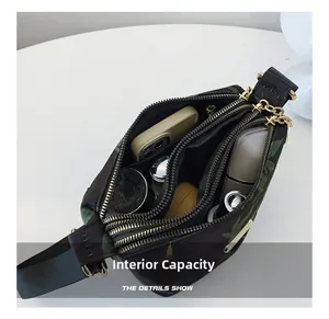 Detail view of large capacity waterproof nylon crossbody bag with triple zipper pockets
