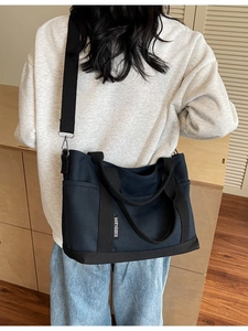 Navy blue large capacity canvas tote bag with adjustable shoulder strap for women