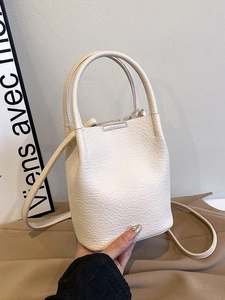 Minimalist white litchi pattern bucket bag with handles and detachable shoulder strap