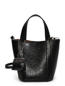 Modern black leather tote bag with lychee texture and mini charm bag on silver chain