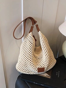 Chic hollow-out crochet tote bag with brown leather straps for casual summer style