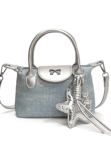 Chic light blue denim shoulder bag with silver sequins and metallic bow buckle