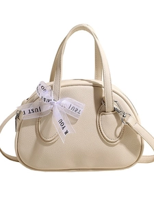 Elegant beige shell-shaped handbag with mesh bow and detachable shoulder strap