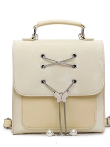 Mini sac à dos chic crème et jaune avec boucle papillon et détails de chaîne argent