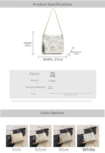 Detail showing embroidered Hanfu style bucket bag with butterfly pattern and tassel