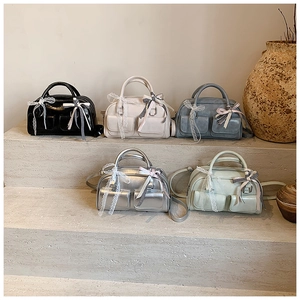Multiple colors of multi-pocket Boston bags with lace trim and bowknot details