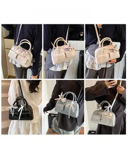 Detail showing multi-pocket boston bag with lace bow decoration and various carrying styles