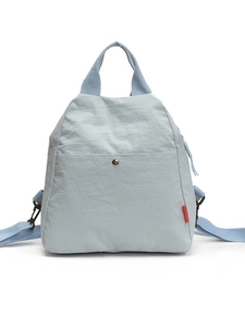 Versatile light blue nylon chest bag for commuting and travel with double shoulder straps
