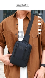 Close-up of black denim chest bag with SPORT embossing on a male model in the sun