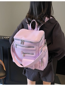 Pink multi-pocket faux leather backpack with multiple zippers and large capacity
