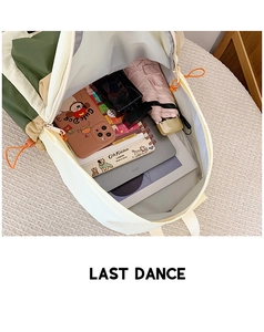 Interior view showing the large capacity for tablets and umbrellas in the nylon backpack