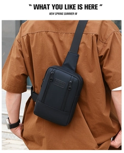 Detail of black sporty chest bag with SPORT logo and adjustable strap on male model