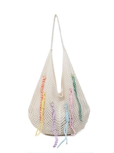 White crochet beach tote bag with colorful rope charms and hollow knit design for women