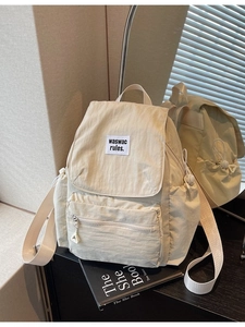 Grande zaino beige in nylon per studenti con chiusura a patta e spallacci regolabili