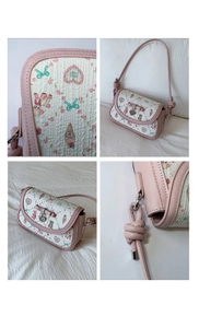Detailed close-up views of a pink quilted crossbody bag with bear prints and bow charms