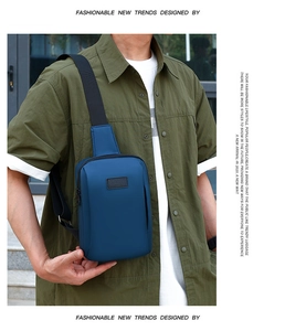 Blue sports chest bag for men with black shoulder strap and adjustable zipper