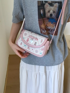 Pink balletcore crossbody bag with cute cartoon prints and bow decoration