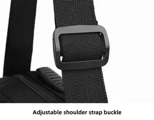 Macro shot of durable black nylon strap with adjustable plastic buckle for shoulder bag