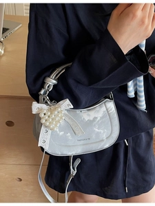 Silver crescent moon shoulder bag with lace bow and pearl heart charm accessory