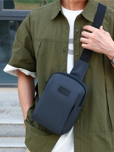 Minimalist navy blue waterproof sling bag for men with adjustable shoulder strap