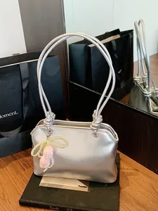 Silver metallic shoulder bag with tulip charm and pearl chain for casual fashion