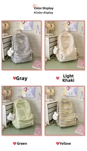 Checkered pattern backpacks in grey, khaki, green, and yellow with bunny pendants