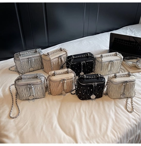 Quilted chain shoulder bags with silver rivets in silver, gold, black and cream white
