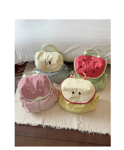 Detailed view of four colorful fruit-themed drawstring backpacks in pastel colors