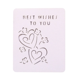 Detail of laser-cut purple card with heart patterns and Best Wishes to You text