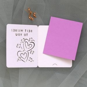 Laser-cut greeting card with Best Wishes lettering and purple insert on mesh background