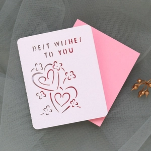 Detailed laser-cut greeting card with Best Wishes text and heart patterns on mesh