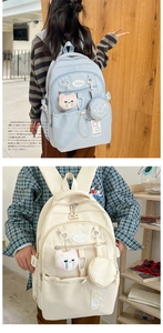 Detail view of water-resistant nylon backpack with multi-pocket design and cute charms